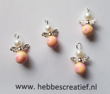 Engel bloem geel met roze bloem