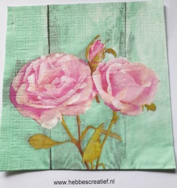 Servetten roze rozen goene achtergrond